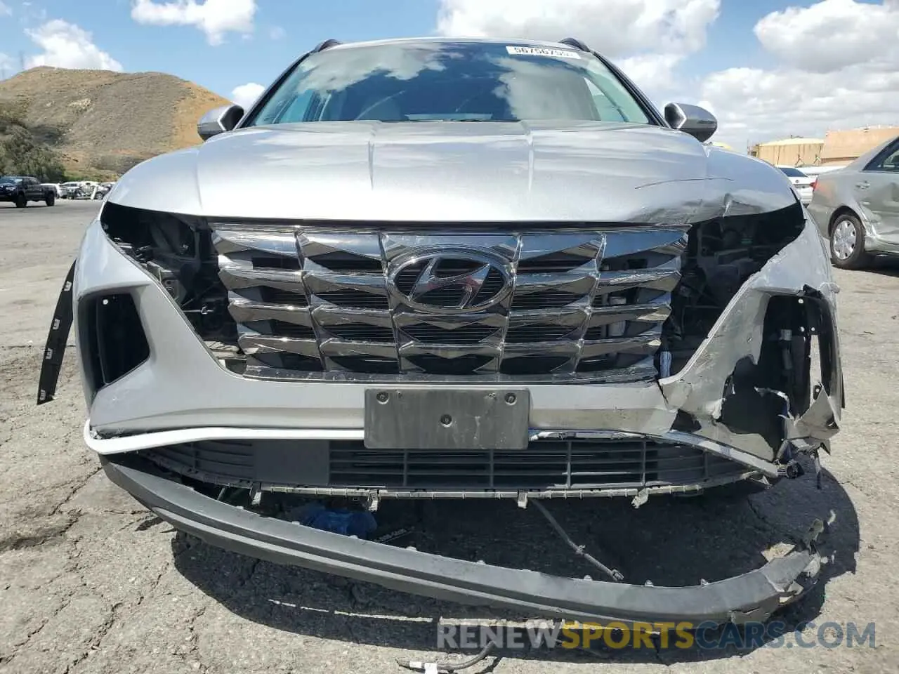 5 Photograph of a damaged car 5NMJC3AE6NH039674 HYUNDAI TUCSON 2022