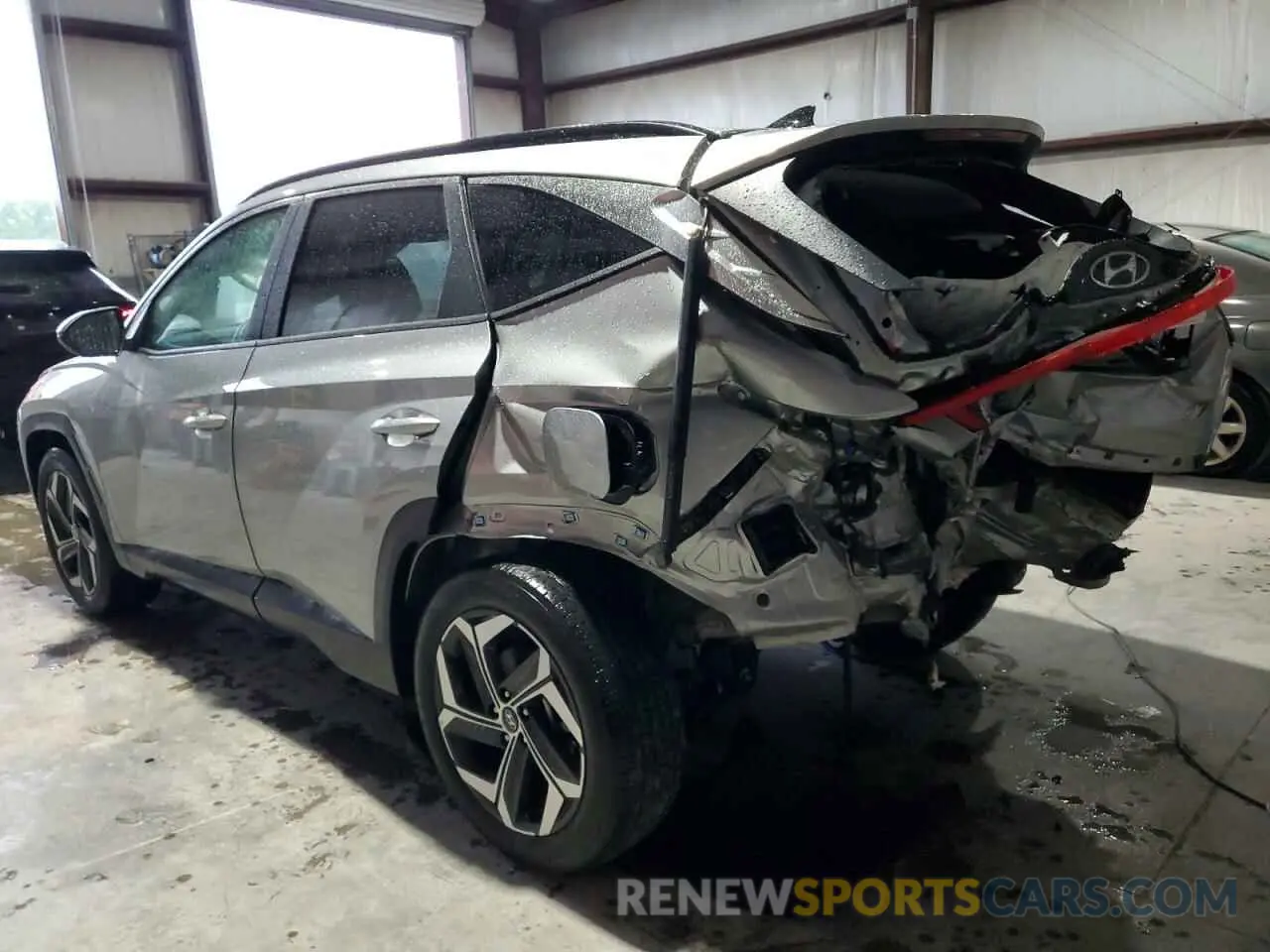 2 Photograph of a damaged car 5NMJC3AE6NH089247 HYUNDAI TUCSON 2022