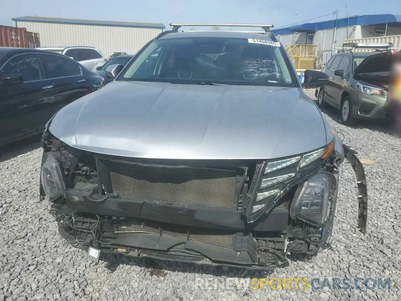 5 Photograph of a damaged car 5NMJC3AE6NH130654 HYUNDAI TUCSON 2022