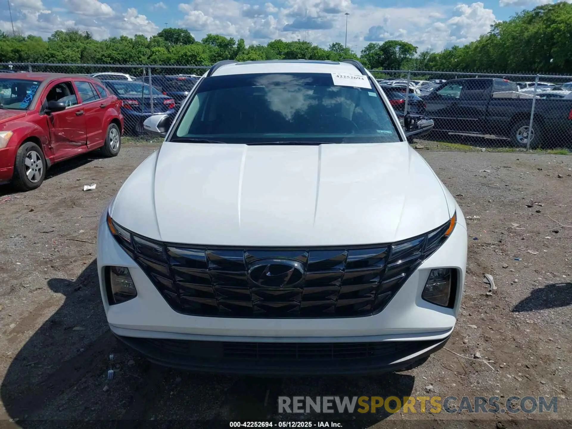 12 Photograph of a damaged car 5NMJC3AE7NH057679 HYUNDAI TUCSON 2022