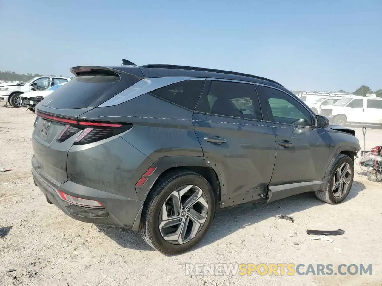 3 Photograph of a damaged car 5NMJC3AE7NH158043 HYUNDAI TUCSON 2022