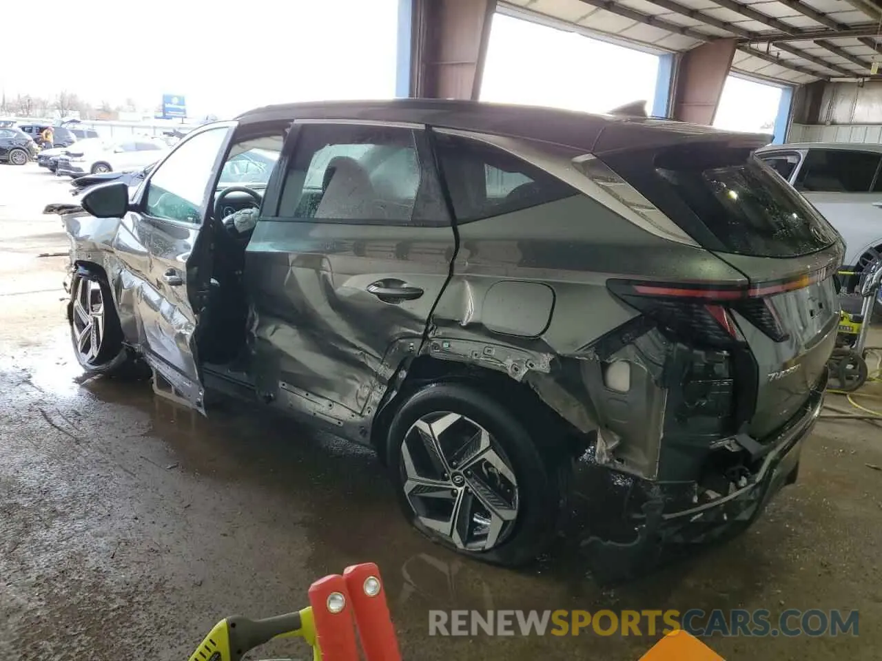 2 Photograph of a damaged car 5NMJC3AEXNH133590 HYUNDAI TUCSON 2022