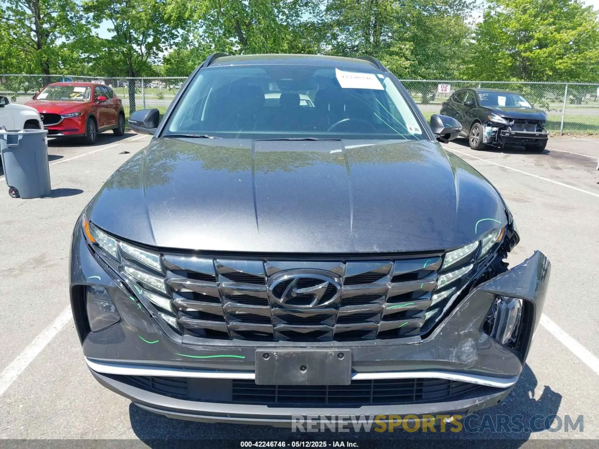 12 Photograph of a damaged car 5NMJCCAE1NH017789 HYUNDAI TUCSON 2022