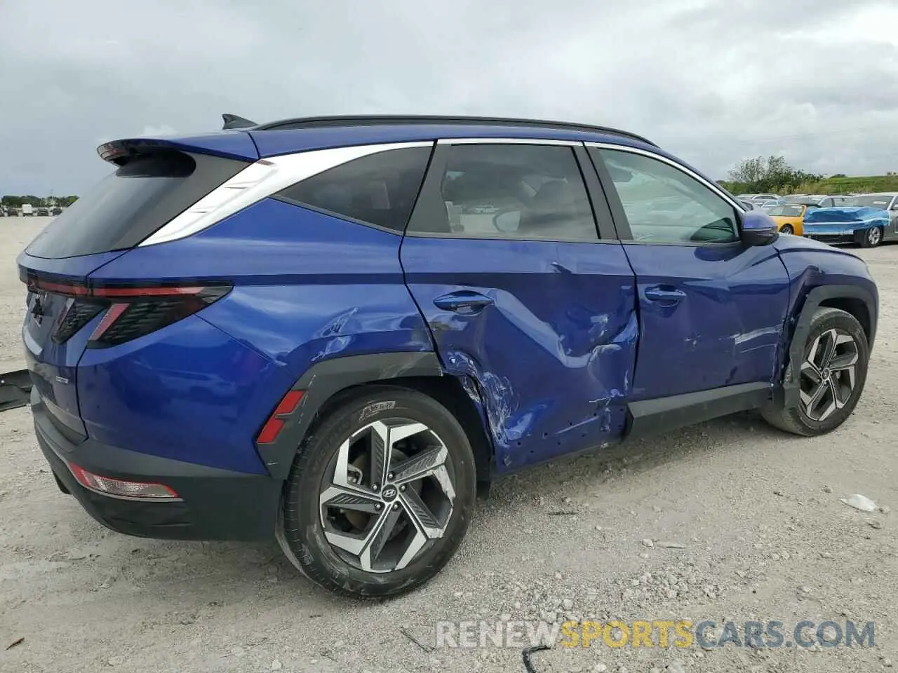 3 Photograph of a damaged car 5NMJCCAE1NH032261 HYUNDAI TUCSON 2022