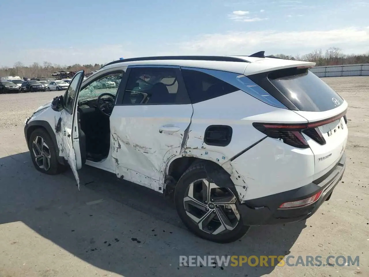 2 Photograph of a damaged car 5NMJCCAE4NH029922 HYUNDAI TUCSON 2022