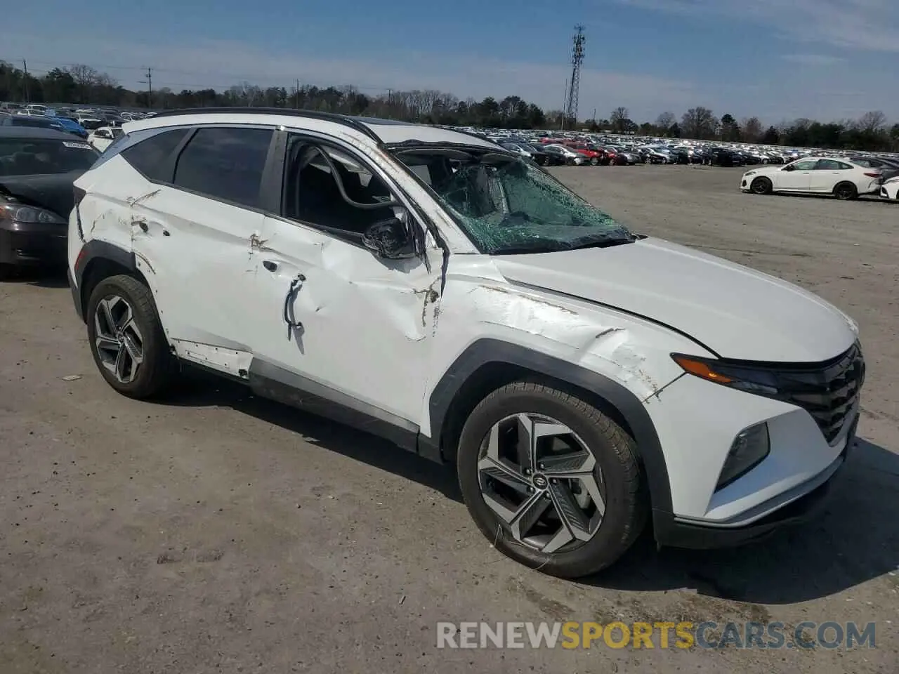 4 Photograph of a damaged car 5NMJCCAE4NH029922 HYUNDAI TUCSON 2022
