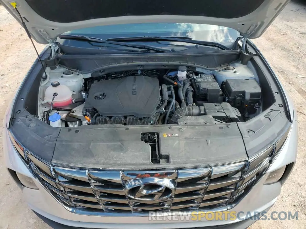 12 Photograph of a damaged car 5NMJCCAE6NH140049 HYUNDAI TUCSON 2022