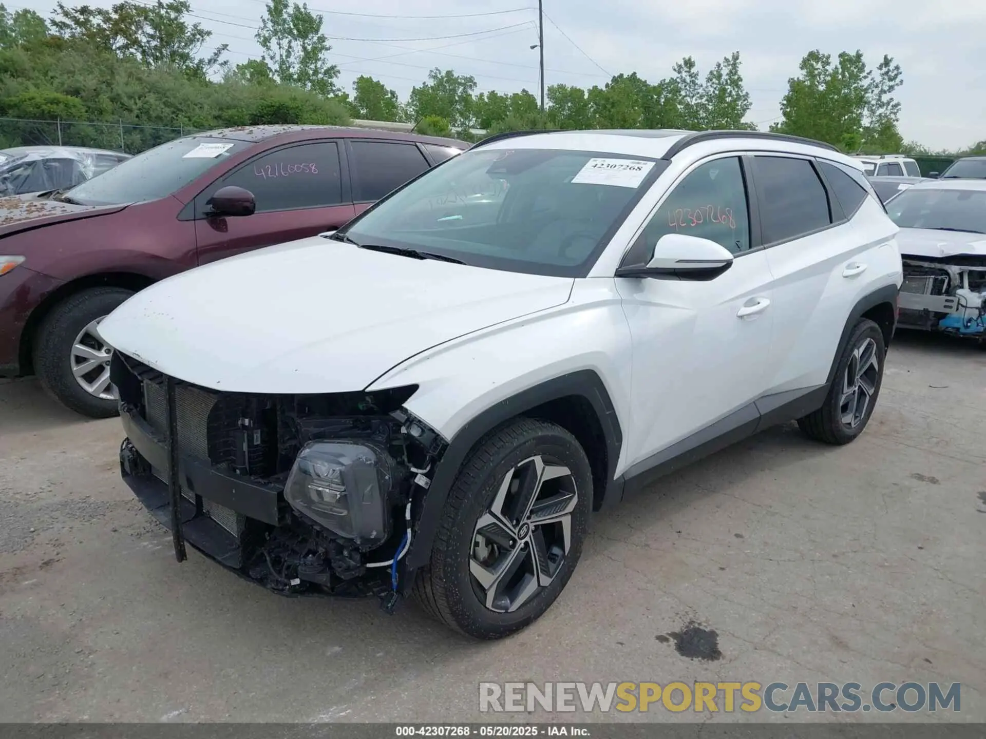 2 Photograph of a damaged car 5NMJCCAE7NH152033 HYUNDAI TUCSON 2022