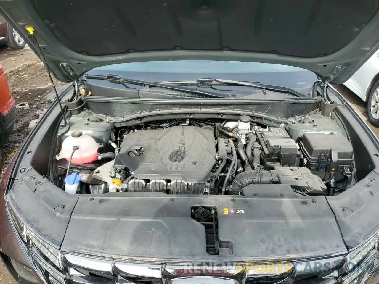 12 Photograph of a damaged car 5NMJCCAE8NH141249 HYUNDAI TUCSON 2022