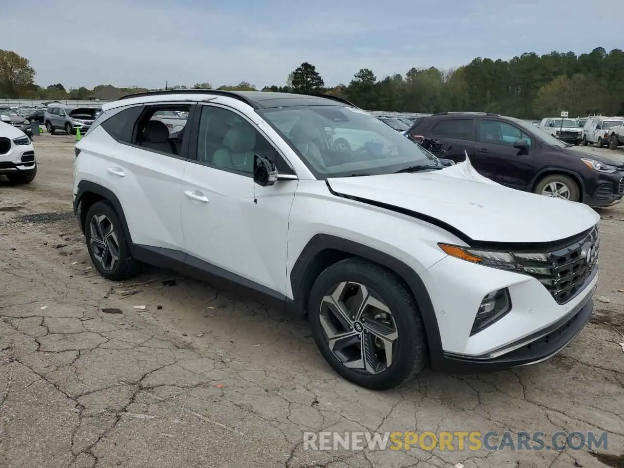 4 Photograph of a damaged car 5NMJE3AE0NH025635 HYUNDAI TUCSON 2022