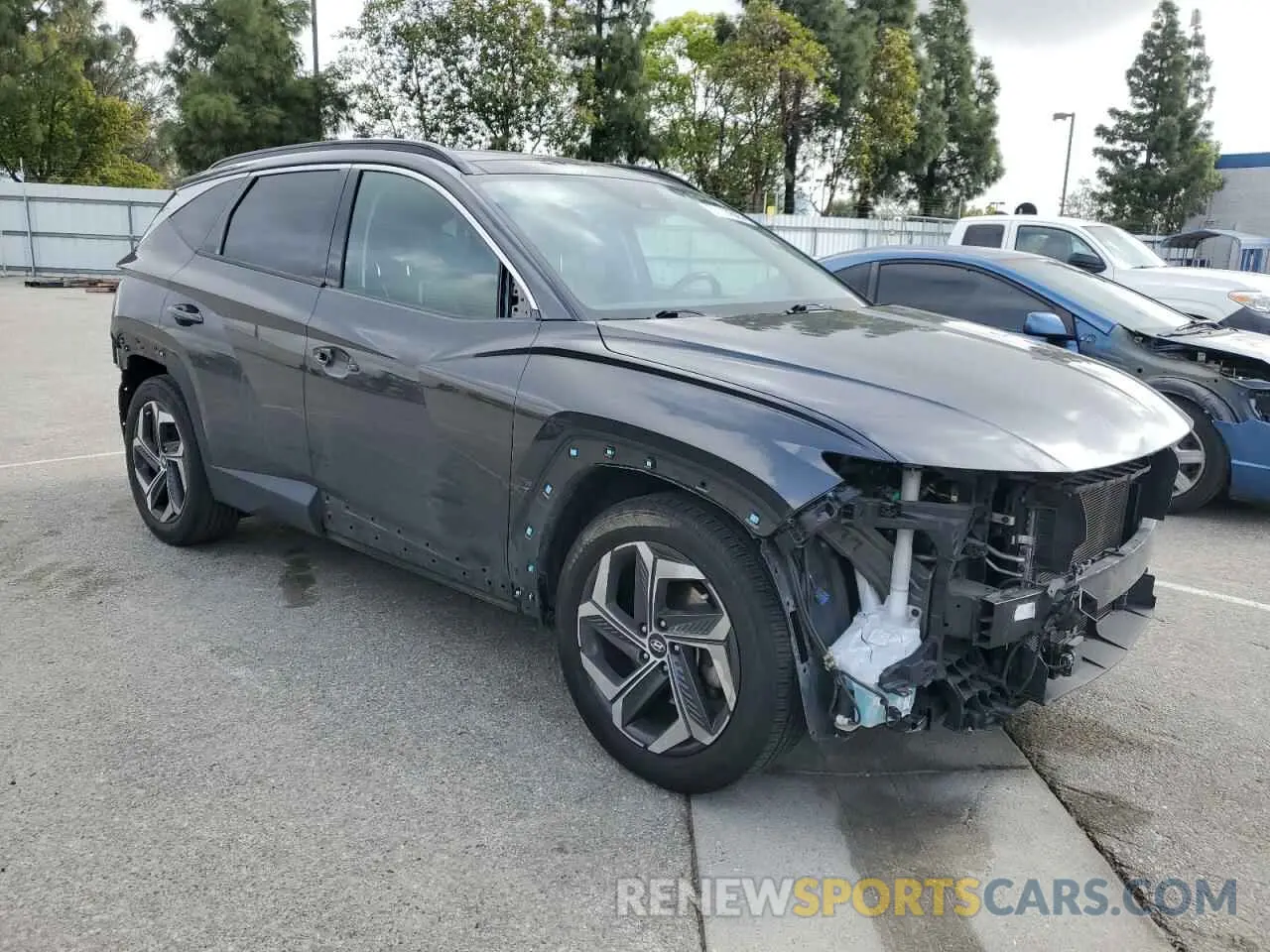 4 Photograph of a damaged car 5NMJE3AE0NH113231 HYUNDAI TUCSON 2022