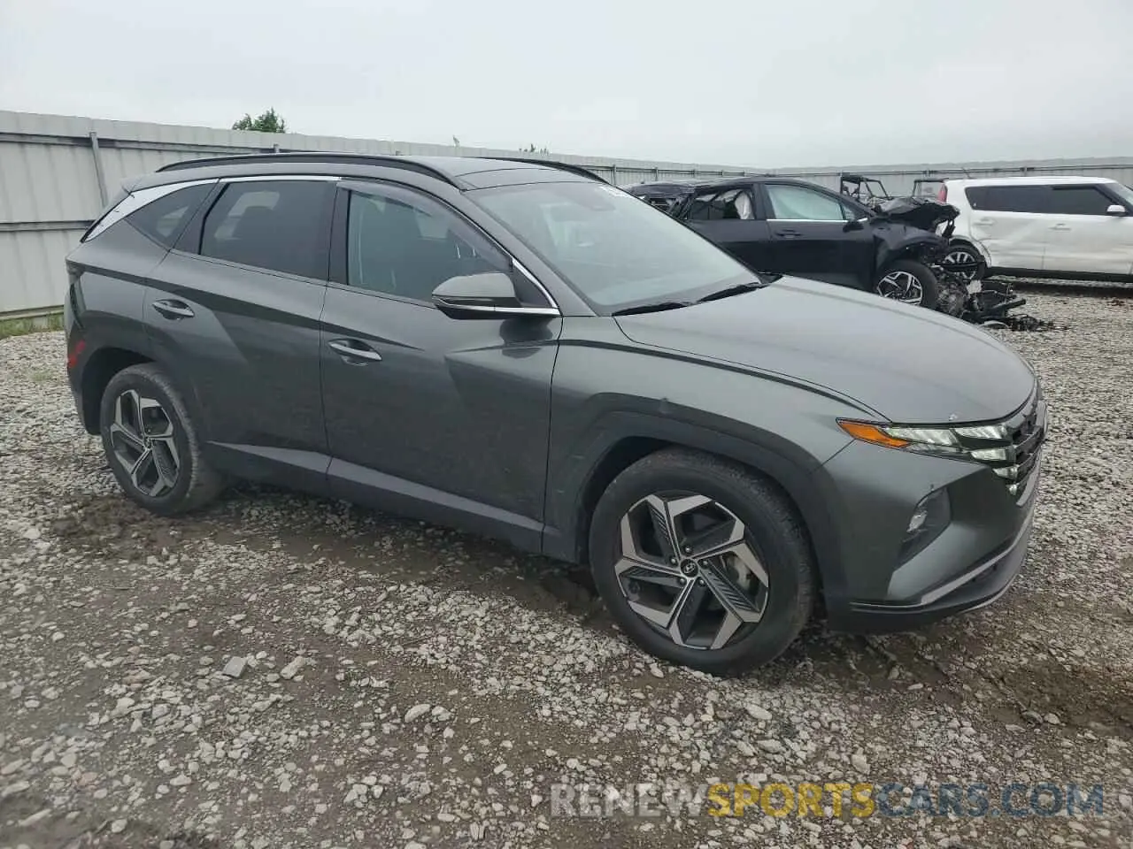 4 Photograph of a damaged car 5NMJE3AE1NH081583 HYUNDAI TUCSON 2022