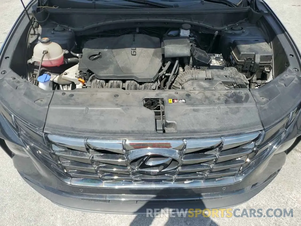 12 Photograph of a damaged car 5NMJE3AE4NH022754 HYUNDAI TUCSON 2022