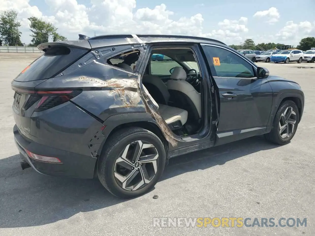 3 Photograph of a damaged car 5NMJE3AE4NH022754 HYUNDAI TUCSON 2022