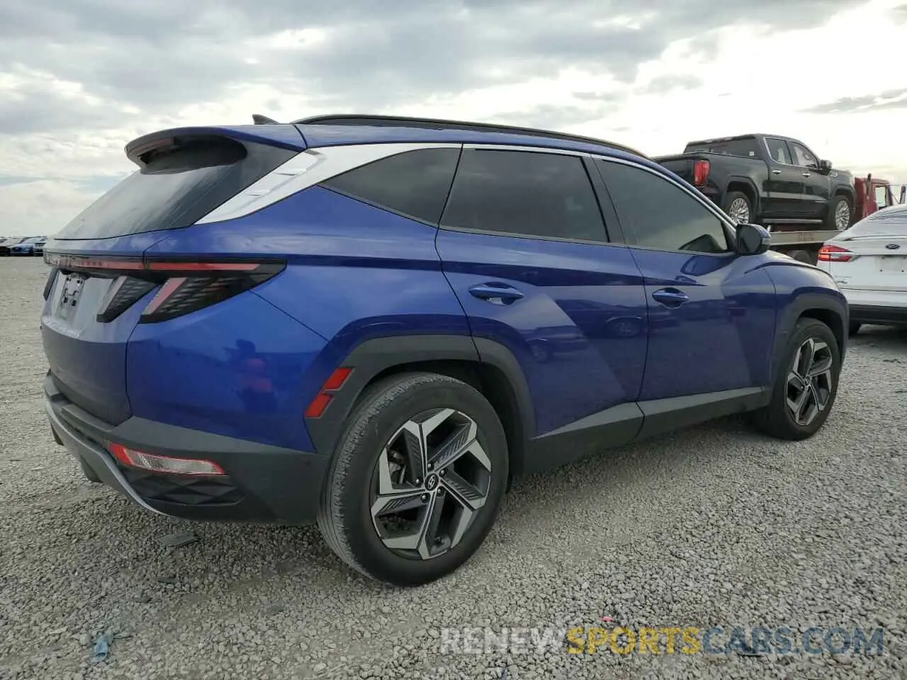 3 Photograph of a damaged car 5NMJE3AE9NH017274 HYUNDAI TUCSON 2022