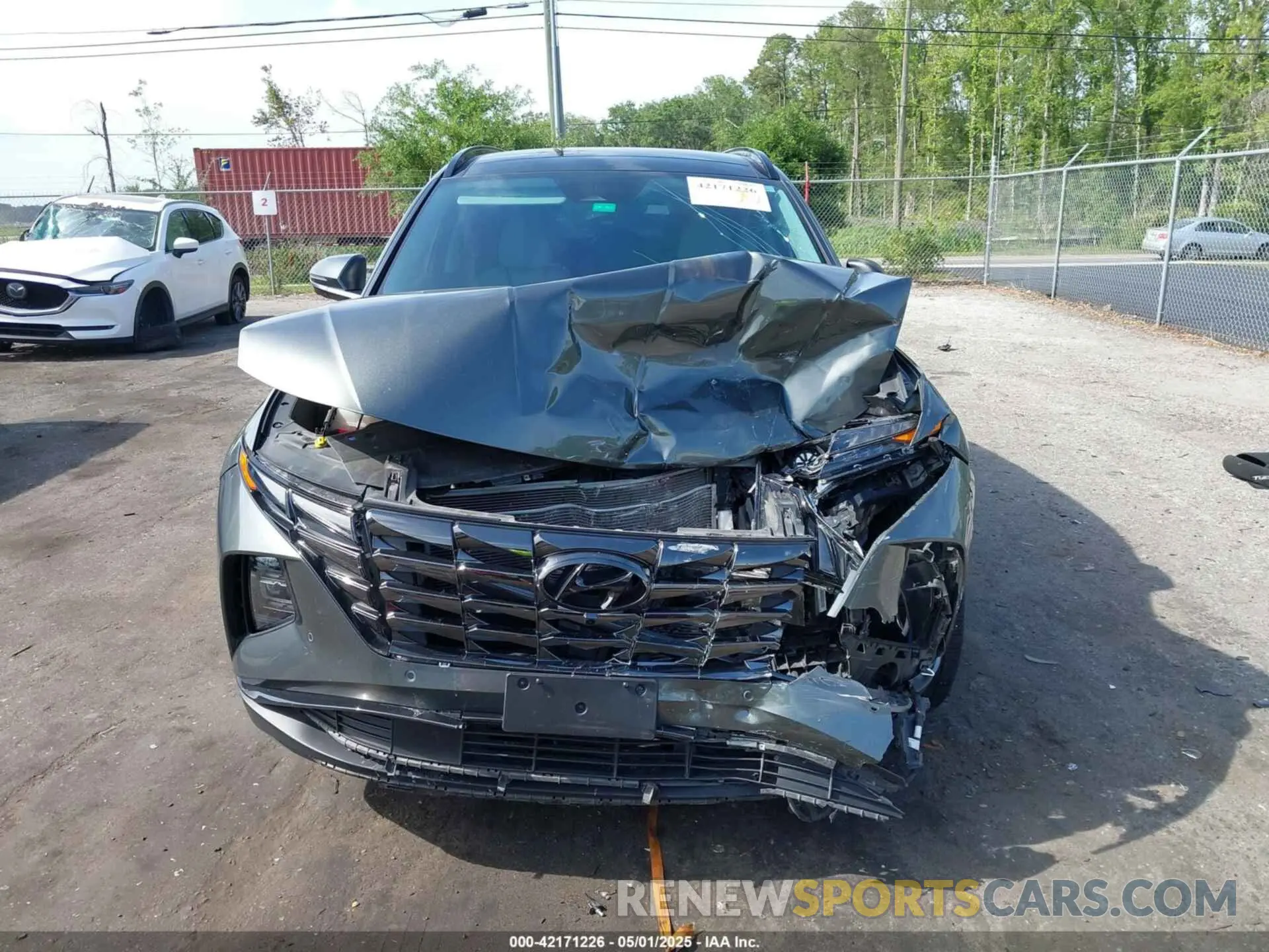 12 Photograph of a damaged car 5NMJE3AE9NH160242 HYUNDAI TUCSON 2022