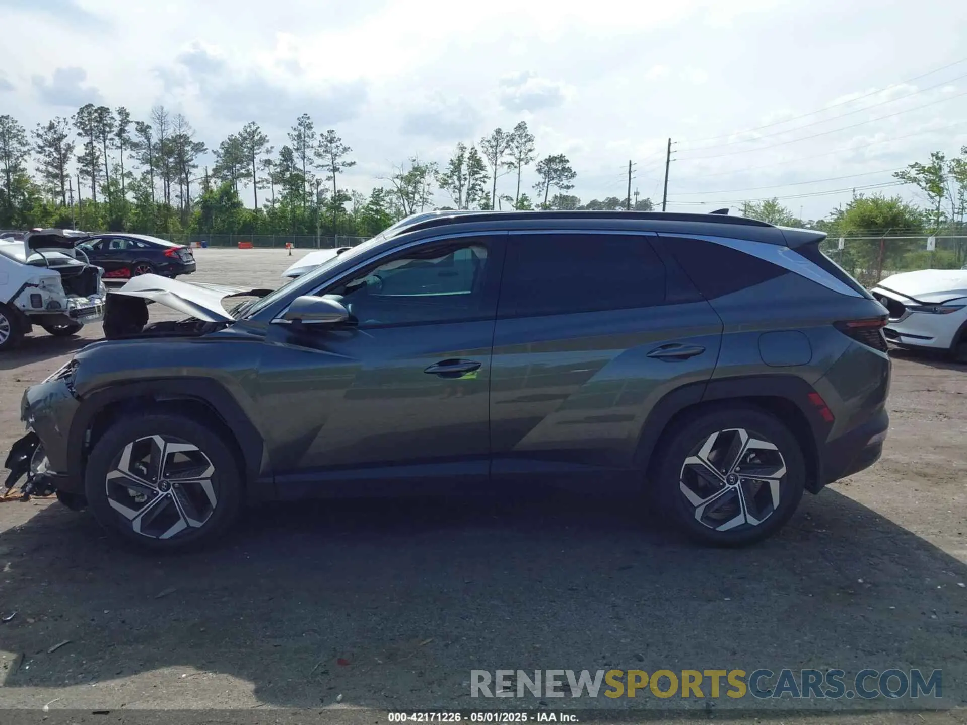14 Photograph of a damaged car 5NMJE3AE9NH160242 HYUNDAI TUCSON 2022