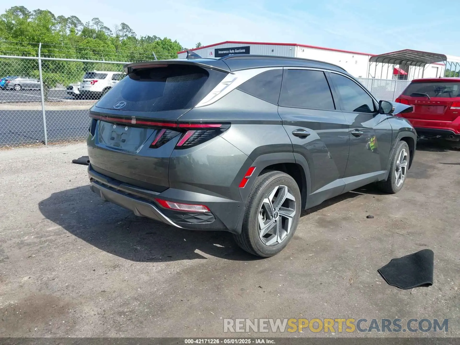 4 Photograph of a damaged car 5NMJE3AE9NH160242 HYUNDAI TUCSON 2022