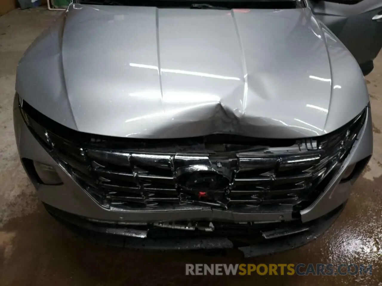 12 Photograph of a damaged car 5NMJECAE1NH101704 HYUNDAI TUCSON 2022