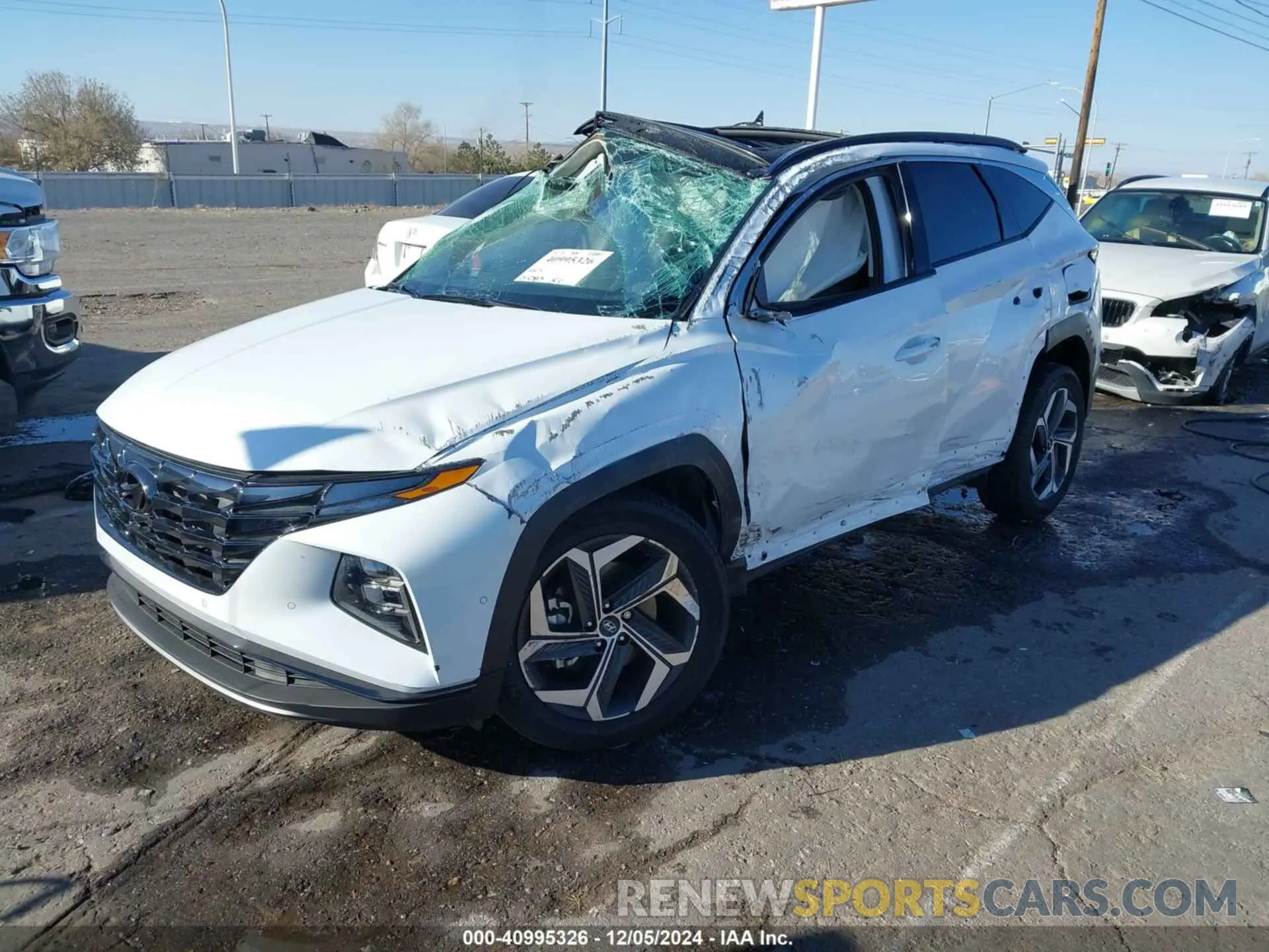2 Photograph of a damaged car 5NMJECAE5NH027087 HYUNDAI TUCSON 2022