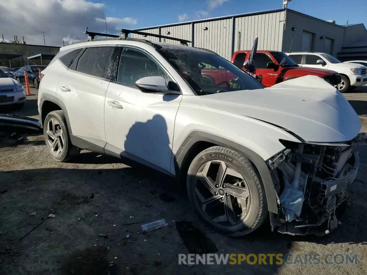 4 Photograph of a damaged car 5NMJECAE5NH103875 HYUNDAI TUCSON 2022