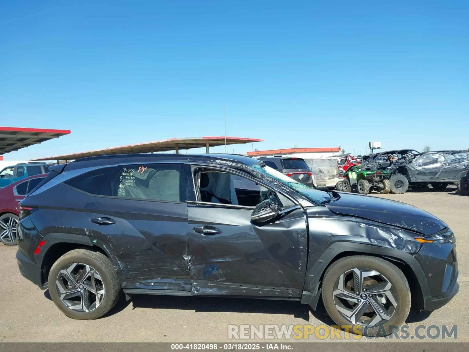 12 Photograph of a damaged car 5NMJECAE8NH146705 HYUNDAI TUCSON 2022