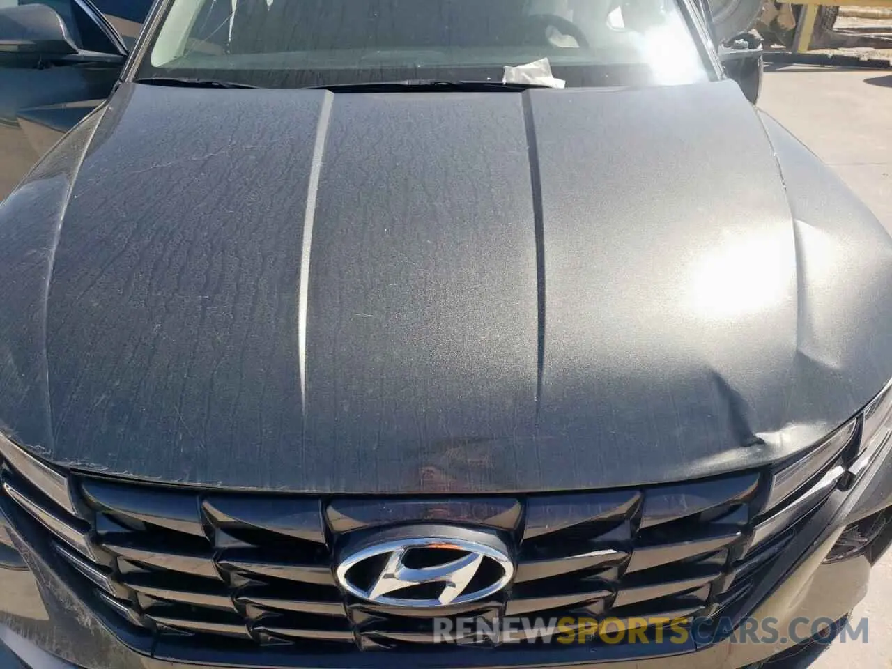 13 Photograph of a damaged car 5NMJF3AE1NH050993 HYUNDAI TUCSON 2022