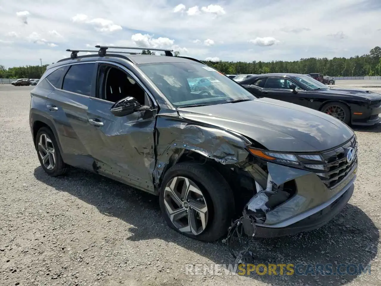 4 Photograph of a damaged car 5NMJF3AE5NH092986 HYUNDAI TUCSON 2022