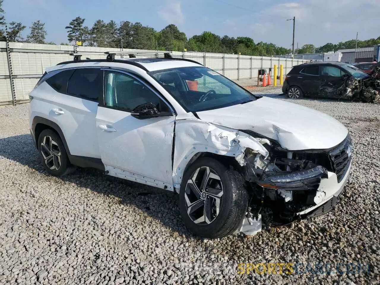 4 Photograph of a damaged car 5NMJF3AE8NH069105 HYUNDAI TUCSON 2022