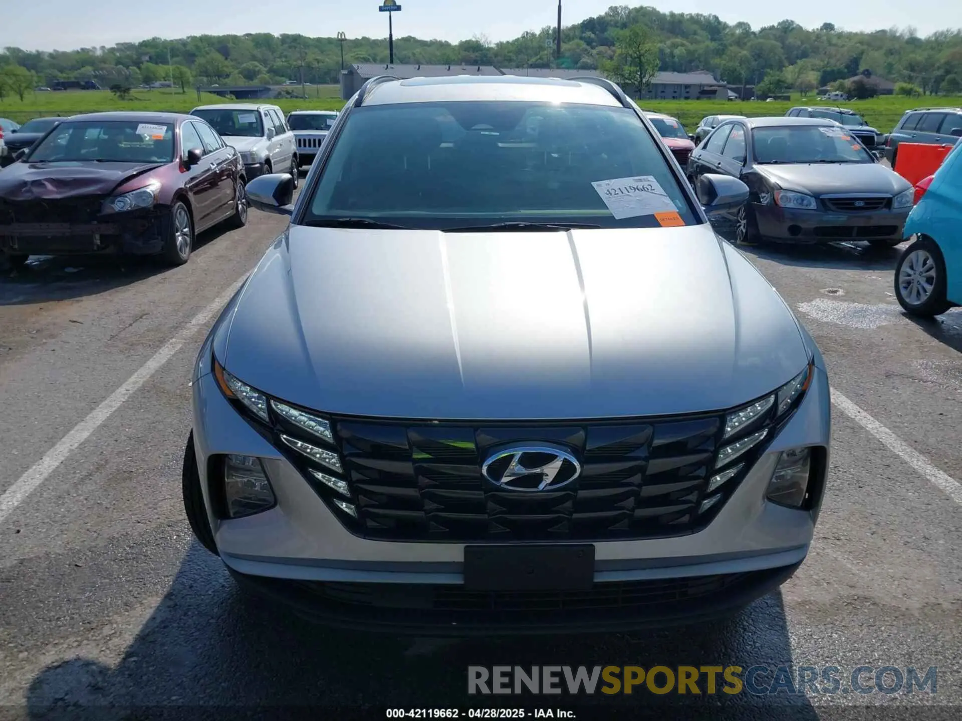 12 Photograph of a damaged car 5NMJFCAE3NH007613 HYUNDAI TUCSON 2022