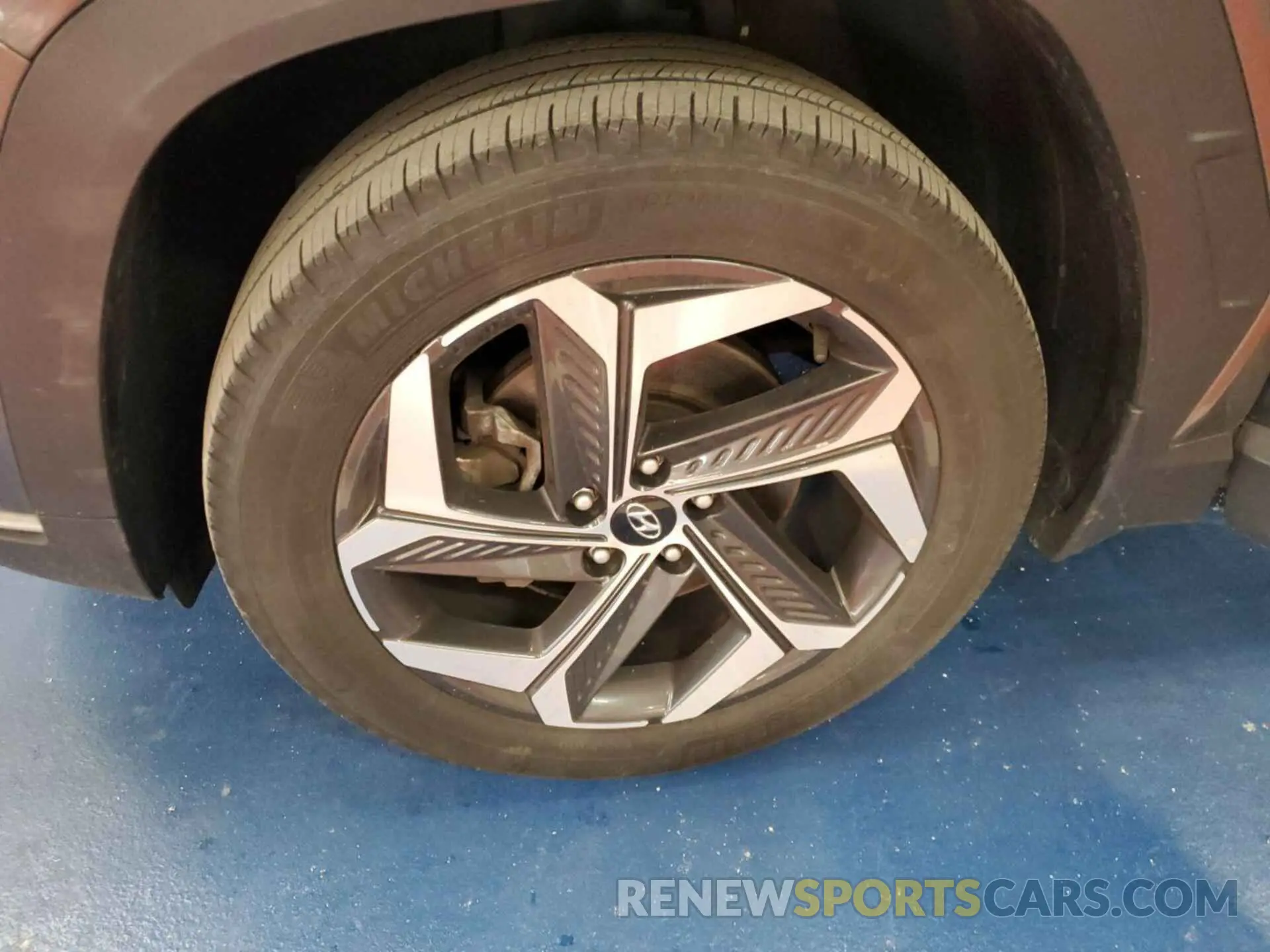 4 Photograph of a damaged car 5NMJFCAE4NH132278 HYUNDAI TUCSON 2022