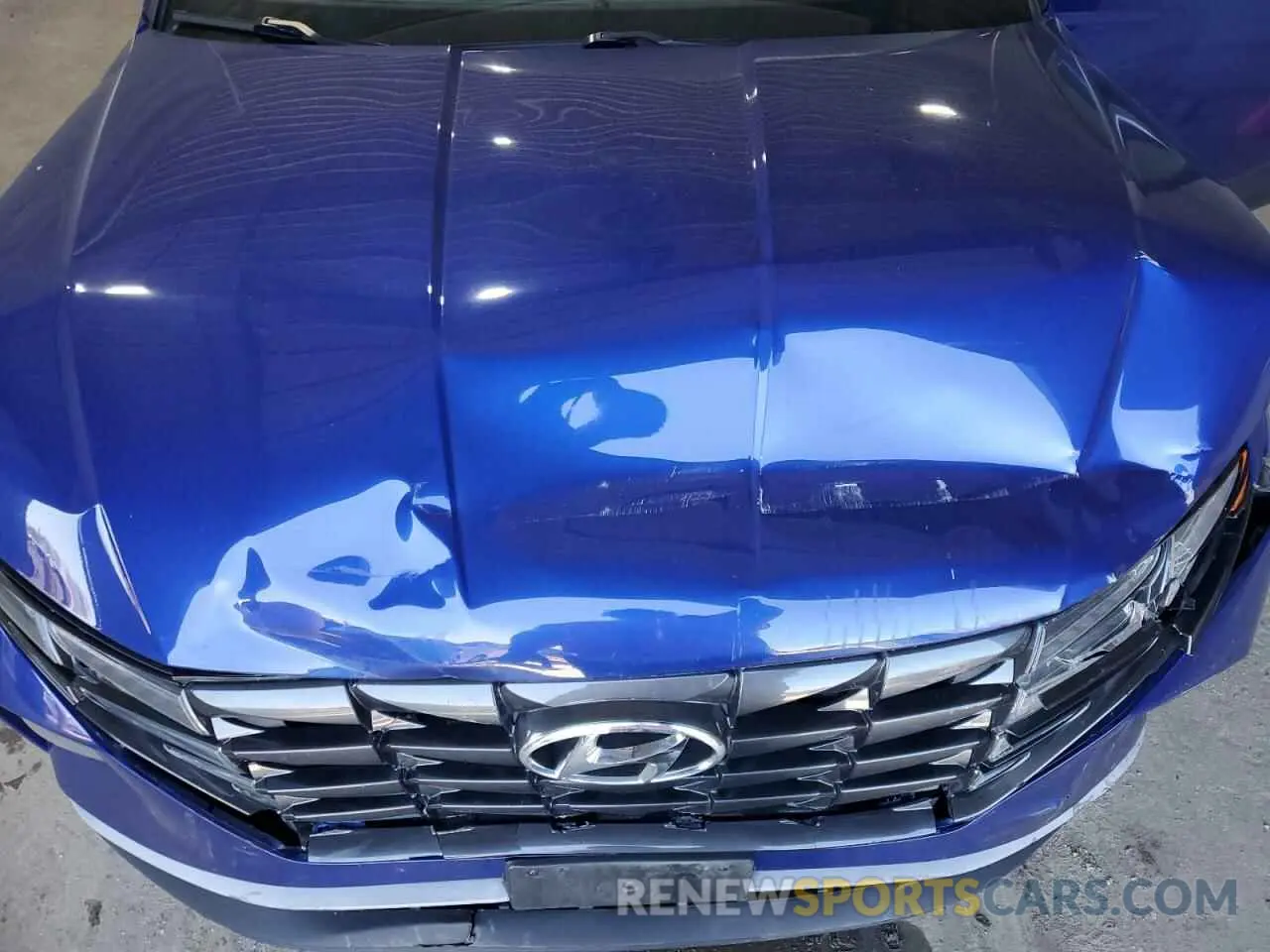 12 Photograph of a damaged car 5NMJFCAE9NH035867 HYUNDAI TUCSON 2022