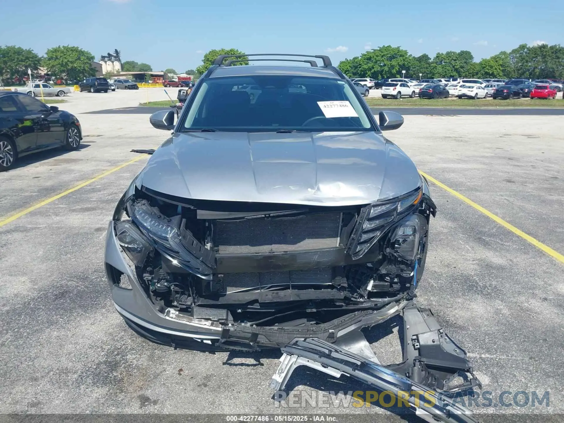 12 Photograph of a damaged car 5NMJB3AE6PH218612 HYUNDAI TUCSON 2023