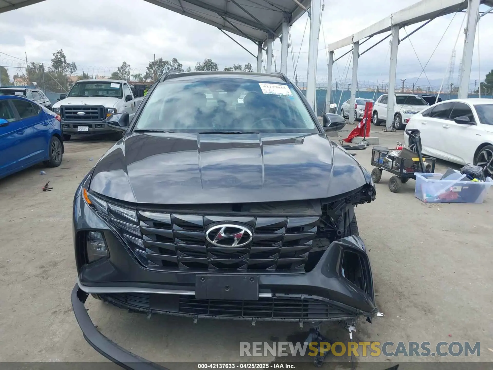12 Photograph of a damaged car 5NMJBCAE2PH289192 HYUNDAI TUCSON 2023