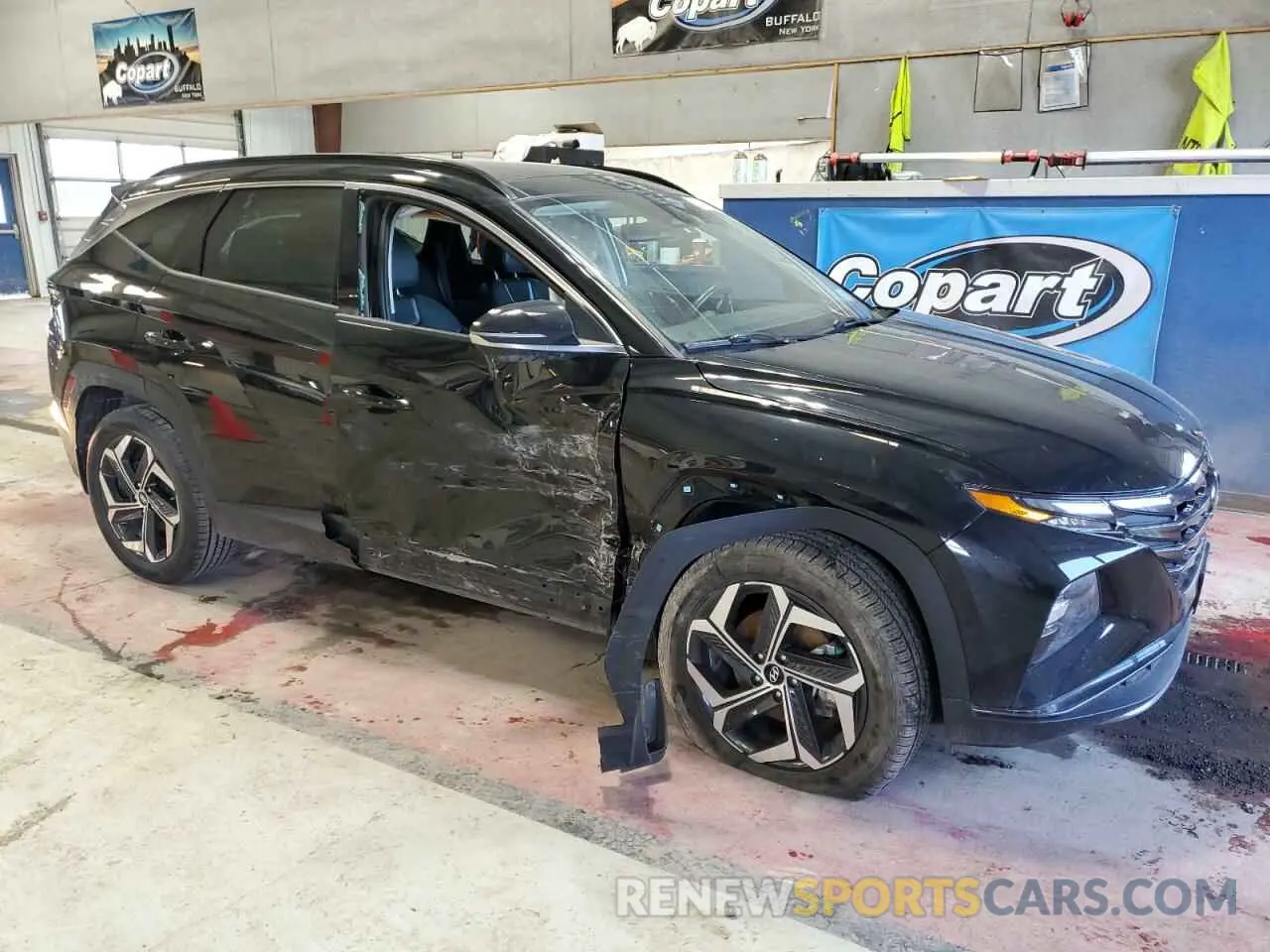 4 Photograph of a damaged car 5NMJECAE8PH279130 HYUNDAI TUCSON 2023