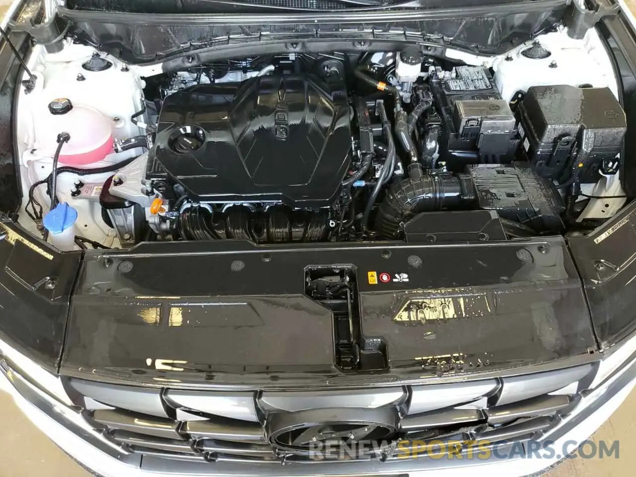 12 Photograph of a damaged car 5NMJF3AE4PH275797 HYUNDAI TUCSON 2023
