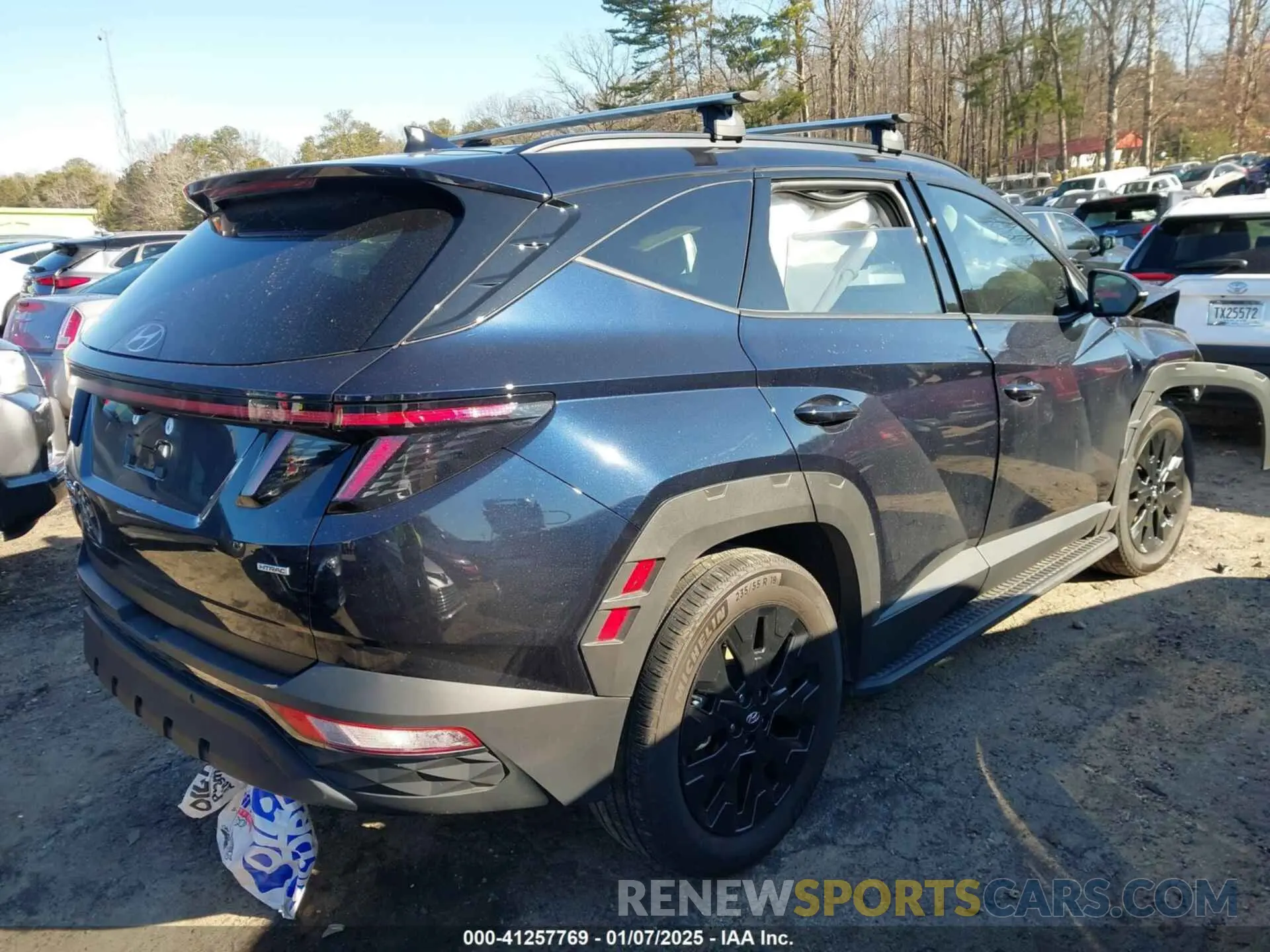 4 Photograph of a damaged car KM8JFCAEXPU217875 HYUNDAI TUCSON 2023