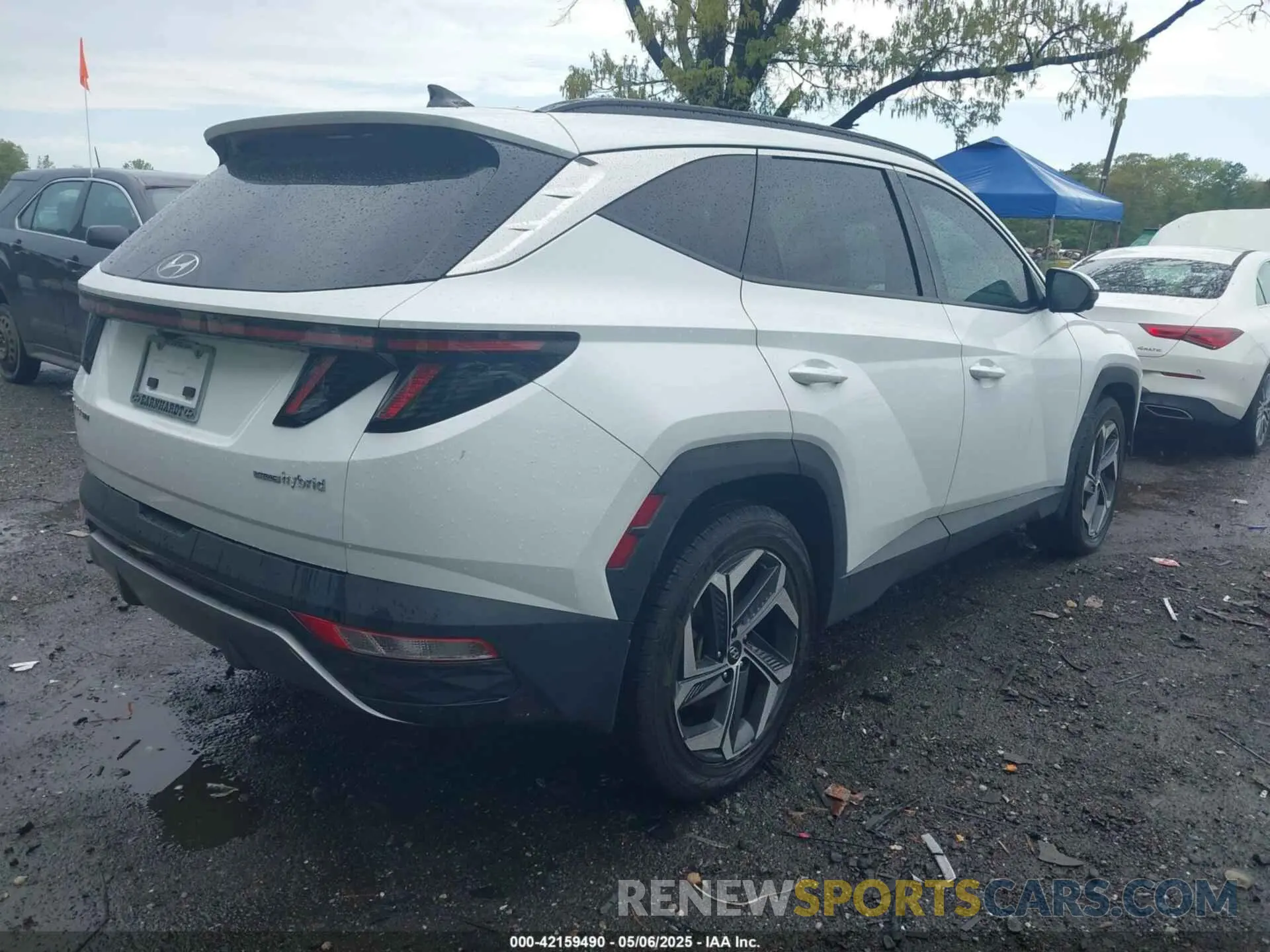 4 Photograph of a damaged car KM8JECA10NU060726 HYUNDAI TUCSON HYBRID 2022