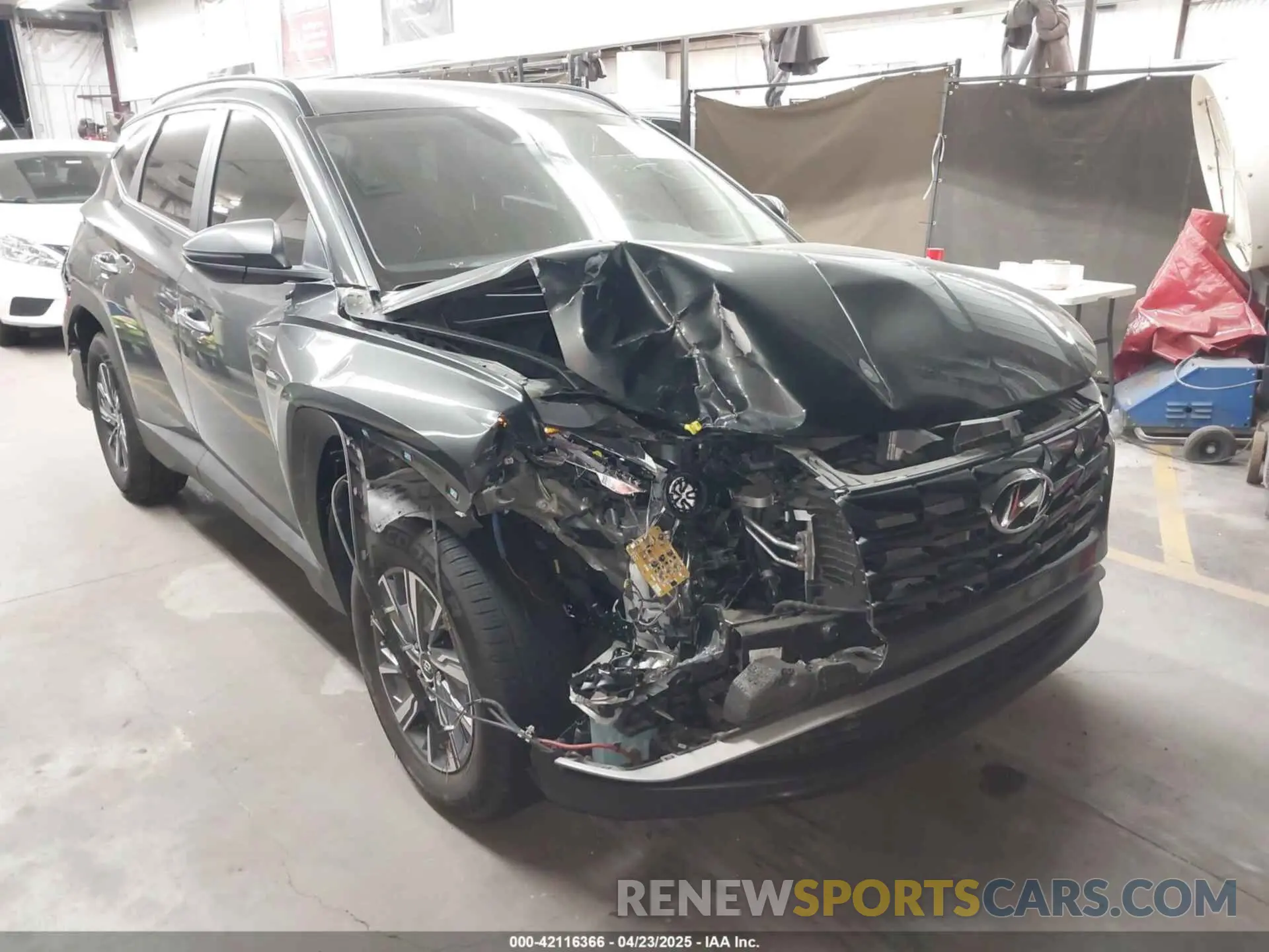 1 Photograph of a damaged car KM8JBCA14PU100284 HYUNDAI TUCSON HYBRID 2023