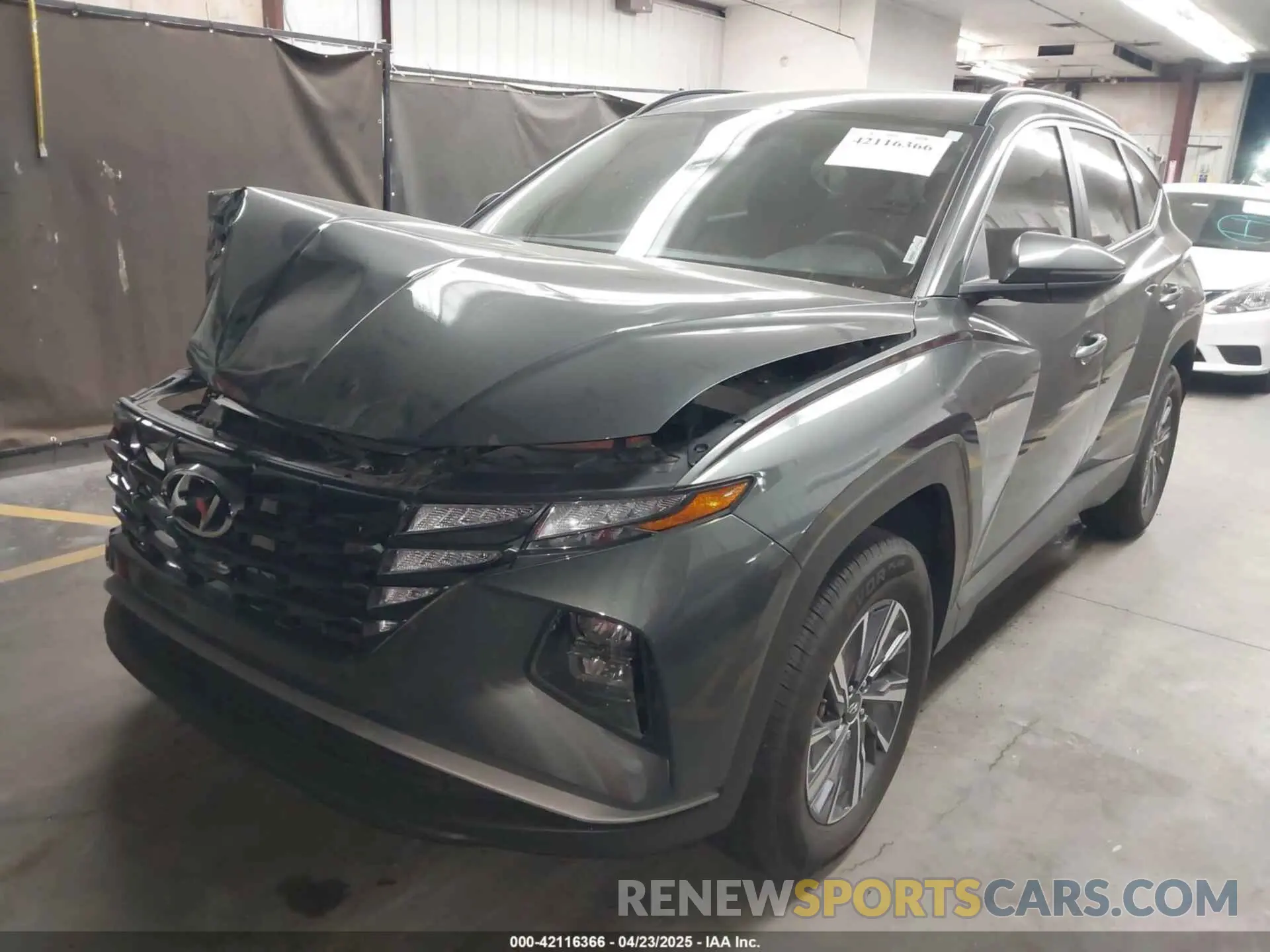 2 Photograph of a damaged car KM8JBCA14PU100284 HYUNDAI TUCSON HYBRID 2023