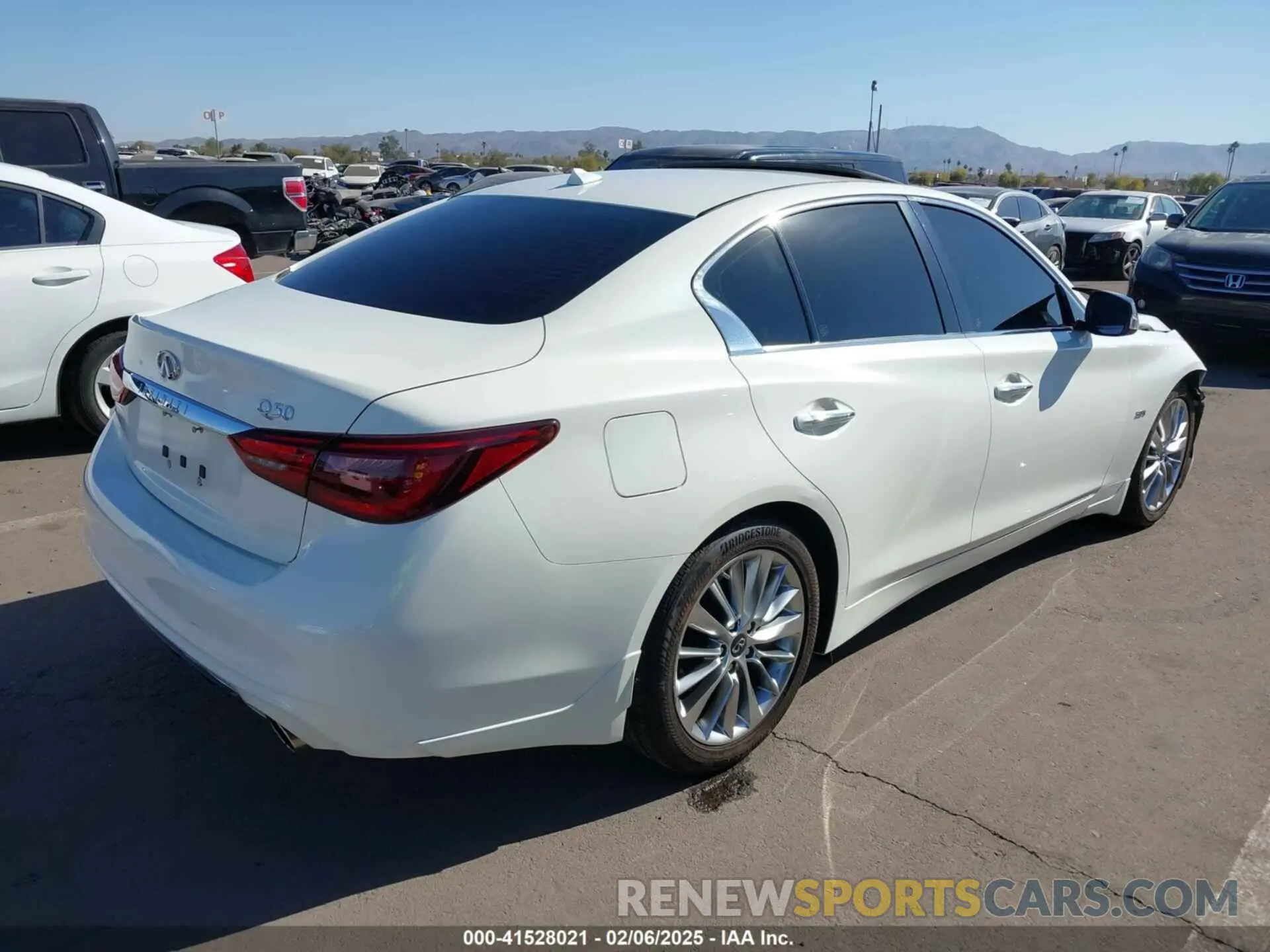 4 Photograph of a damaged car JN1EV7AP5KM514713 INFINITI Q50 2019