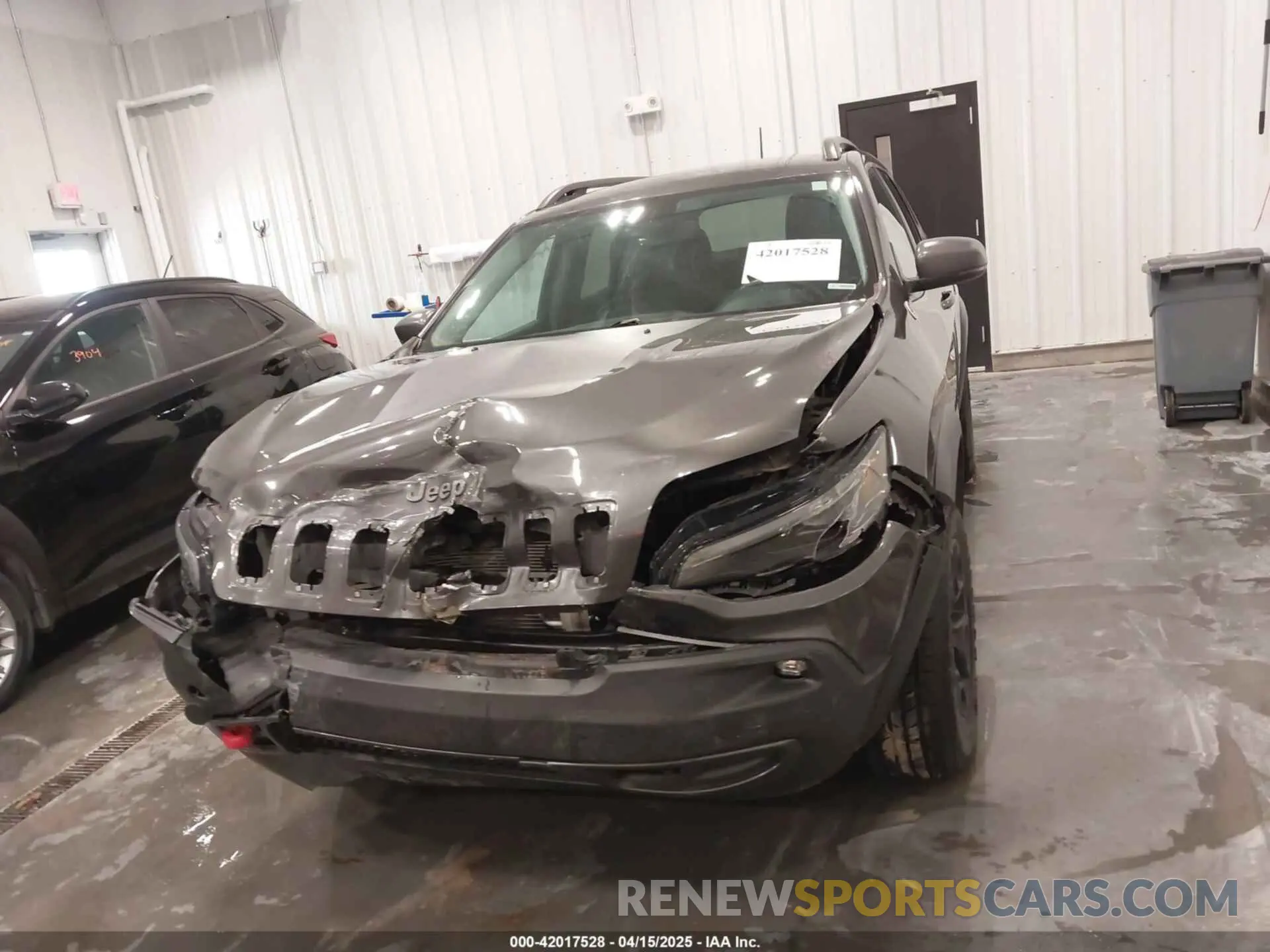 12 Photograph of a damaged car 1C4PJMBN2KD258303 JEEP CHEROKEE 2019
