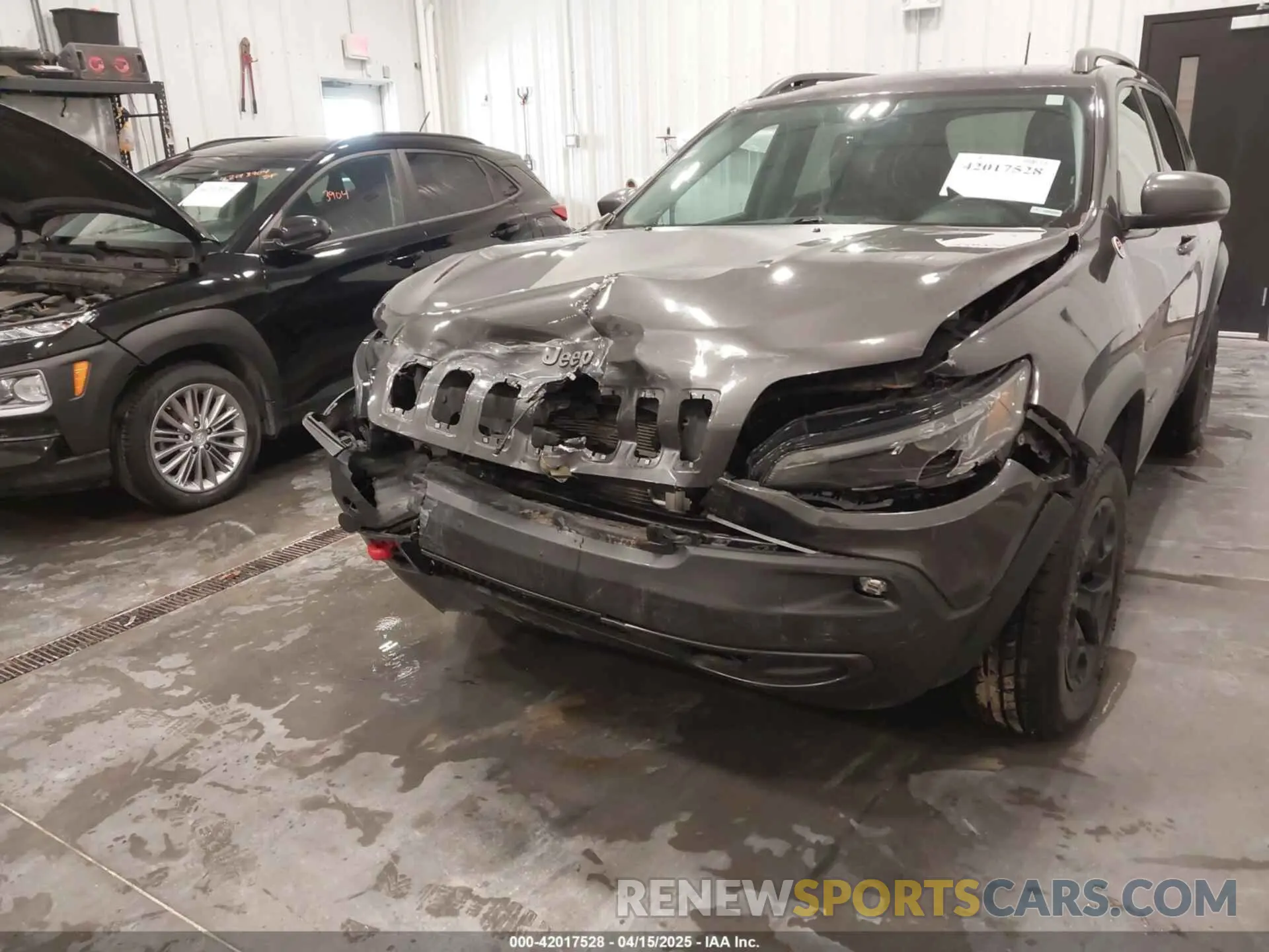 6 Photograph of a damaged car 1C4PJMBN2KD258303 JEEP CHEROKEE 2019