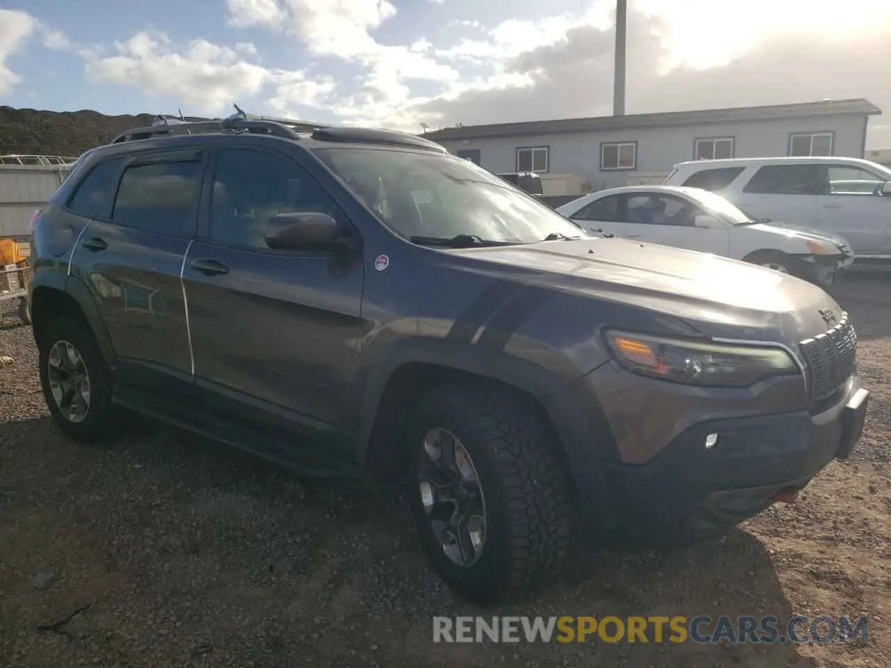 4 Photograph of a damaged car 1C4PJMBX4KD115581 JEEP CHEROKEE 2019