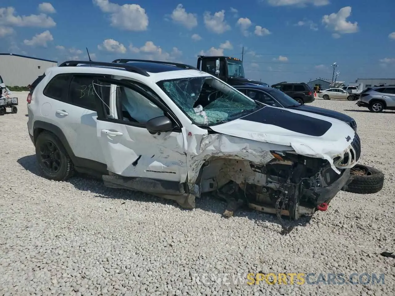 4 Photograph of a damaged car 1C4PJMBX9KD310723 JEEP CHEROKEE 2019