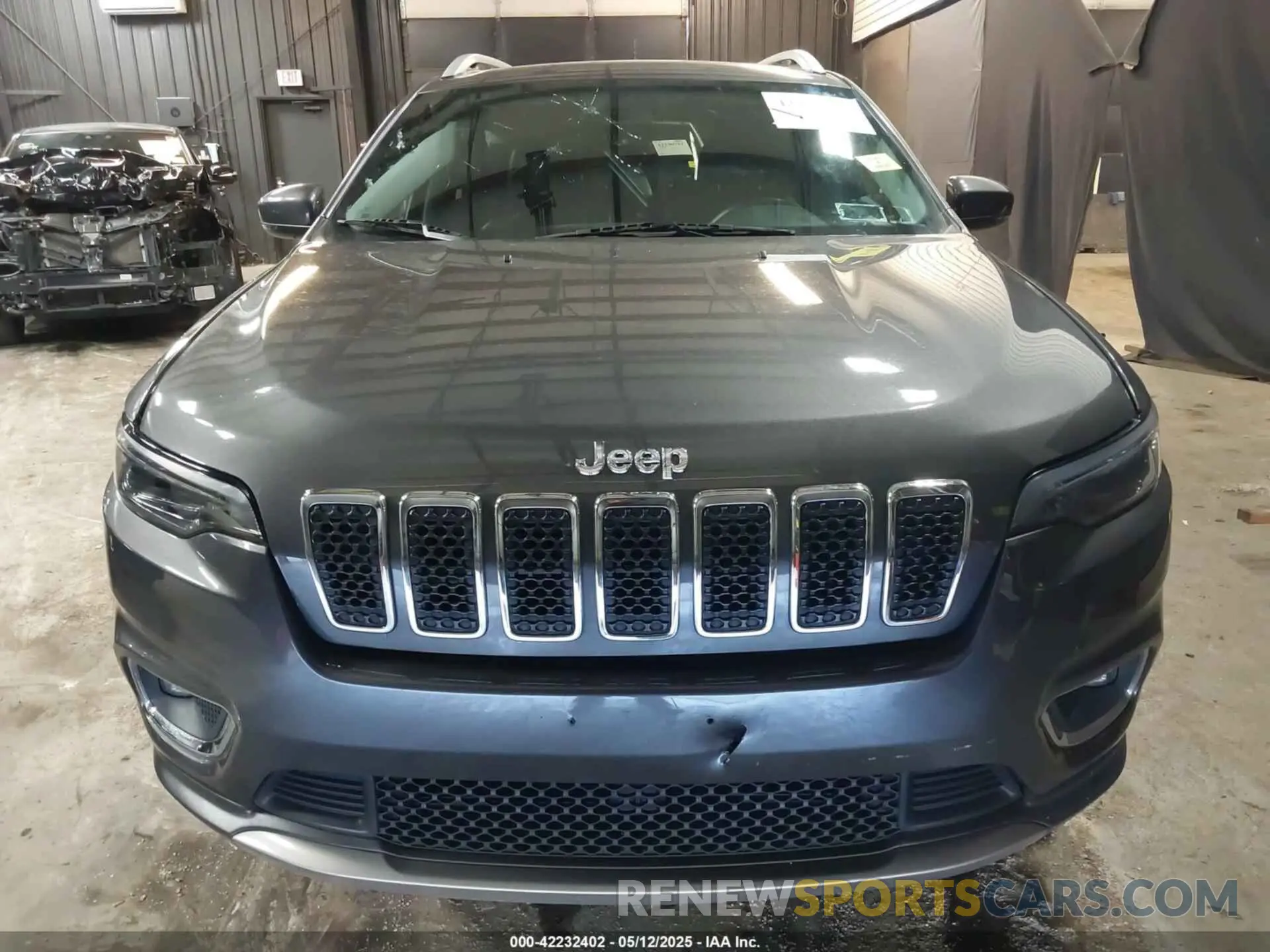 12 Photograph of a damaged car 1C4PJMDX1KD423465 JEEP CHEROKEE 2019