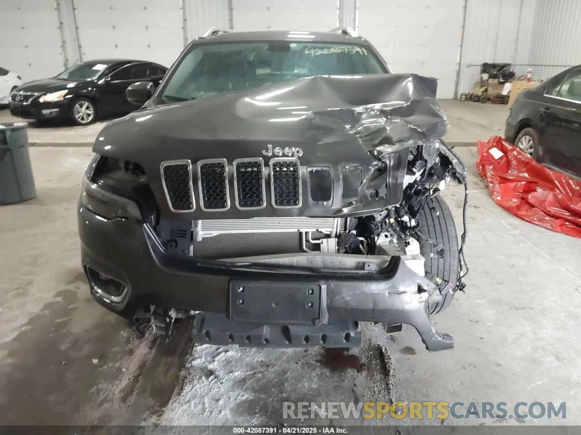 12 Photograph of a damaged car 1C4PJMDX2KD467412 JEEP CHEROKEE 2019