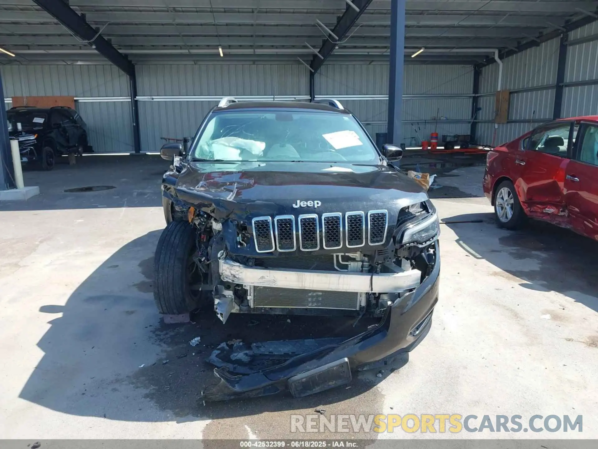 12 Photograph of a damaged car 1C4PJMDXXKD135511 JEEP CHEROKEE 2019