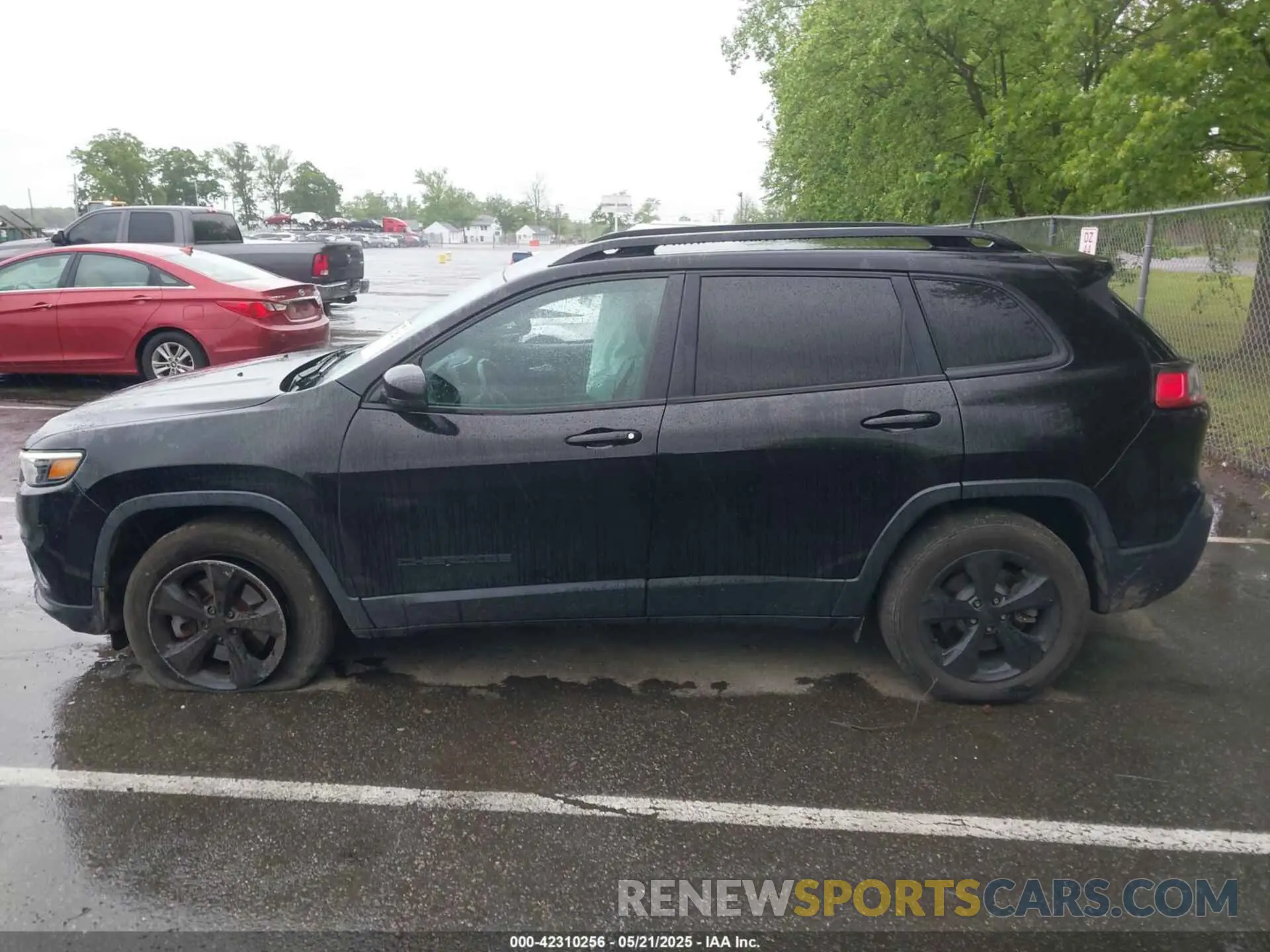 14 Photograph of a damaged car 1C4PJMLN7KD487994 JEEP CHEROKEE 2019