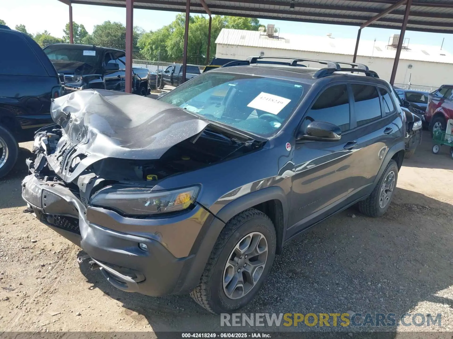 2 Photograph of a damaged car 1C4PJMBX0ND511091 JEEP CHEROKEE 2022